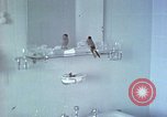 Image of bird in bathroom Berchtesgaden Germany, 1940, second 4 stock footage video 65675077773