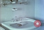 Image of bird in bathroom Berchtesgaden Germany, 1940, second 10 stock footage video 65675077773