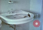 Image of bird in bathroom Berchtesgaden Germany, 1940, second 17 stock footage video 65675077773