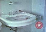 Image of bird in bathroom Berchtesgaden Germany, 1940, second 20 stock footage video 65675077773