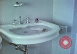 Image of bird in bathroom Berchtesgaden Germany, 1940, second 23 stock footage video 65675077773