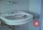 Image of bird in bathroom Berchtesgaden Germany, 1940, second 25 stock footage video 65675077773