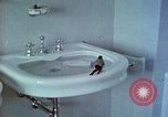 Image of bird in bathroom Berchtesgaden Germany, 1940, second 26 stock footage video 65675077773