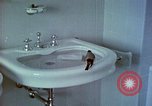 Image of bird in bathroom Berchtesgaden Germany, 1940, second 27 stock footage video 65675077773