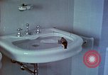 Image of bird in bathroom Berchtesgaden Germany, 1940, second 28 stock footage video 65675077773