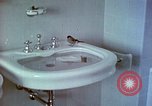 Image of bird in bathroom Berchtesgaden Germany, 1940, second 30 stock footage video 65675077773