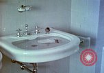 Image of bird in bathroom Berchtesgaden Germany, 1940, second 32 stock footage video 65675077773