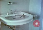 Image of bird in bathroom Berchtesgaden Germany, 1940, second 33 stock footage video 65675077773