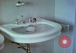 Image of bird in bathroom Berchtesgaden Germany, 1940, second 37 stock footage video 65675077773