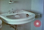 Image of bird in bathroom Berchtesgaden Germany, 1940, second 40 stock footage video 65675077773