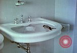 Image of bird in bathroom Berchtesgaden Germany, 1940, second 41 stock footage video 65675077773