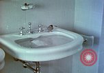 Image of bird in bathroom Berchtesgaden Germany, 1940, second 43 stock footage video 65675077773