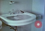 Image of bird in bathroom Berchtesgaden Germany, 1940, second 45 stock footage video 65675077773