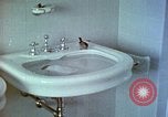 Image of bird in bathroom Berchtesgaden Germany, 1940, second 53 stock footage video 65675077773
