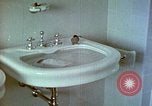 Image of bird in bathroom Berchtesgaden Germany, 1940, second 55 stock footage video 65675077773