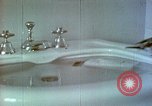 Image of bird in bathroom Berchtesgaden Germany, 1940, second 56 stock footage video 65675077773