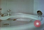 Image of bird in bathroom Berchtesgaden Germany, 1940, second 57 stock footage video 65675077773