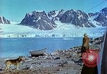 Image of snow covered mountains Greenland, 1938, second 11 stock footage video 65675077798