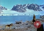 Image of snow covered mountains Greenland, 1938, second 12 stock footage video 65675077798