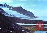 Image of snow covered mountains Greenland, 1938, second 36 stock footage video 65675077798