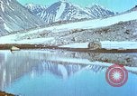Image of snow covered mountains Greenland, 1938, second 47 stock footage video 65675077798