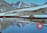 Image of snow covered mountains Greenland, 1938, second 48 stock footage video 65675077798