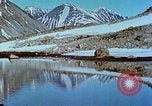 Image of snow covered mountains Greenland, 1938, second 50 stock footage video 65675077798