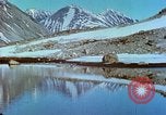 Image of snow covered mountains Greenland, 1938, second 52 stock footage video 65675077798