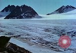 Image of snow covered mountains Greenland, 1938, second 53 stock footage video 65675077798