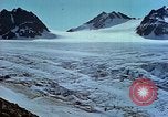 Image of snow covered mountains Greenland, 1938, second 54 stock footage video 65675077798