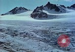 Image of snow covered mountains Greenland, 1938, second 56 stock footage video 65675077798
