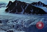 Image of snow covered mountains Greenland, 1938, second 61 stock footage video 65675077798