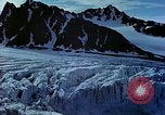 Image of snow covered mountains Greenland, 1938, second 62 stock footage video 65675077798