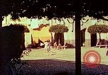 Image of harbor with boats and yachts Portofino Italy, 1938, second 1 stock footage video 65675077853