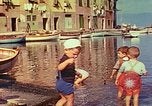 Image of harbor with boats and yachts Portofino Italy, 1938, second 36 stock footage video 65675077853