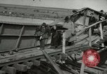 Image of German civilians cross severely damaged bridge over Elbe River Tangermunde Germany, 1945, second 26 stock footage video 65675077887