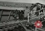 Image of German civilians cross severely damaged bridge over Elbe River Tangermunde Germany, 1945, second 27 stock footage video 65675077887