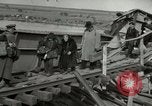 Image of German civilians cross severely damaged bridge over Elbe River Tangermunde Germany, 1945, second 28 stock footage video 65675077887