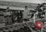 Image of German civilians cross severely damaged bridge over Elbe River Tangermunde Germany, 1945, second 29 stock footage video 65675077887