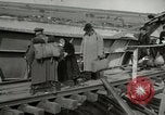 Image of German civilians cross severely damaged bridge over Elbe River Tangermunde Germany, 1945, second 30 stock footage video 65675077887