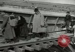 Image of German civilians cross severely damaged bridge over Elbe River Tangermunde Germany, 1945, second 32 stock footage video 65675077887