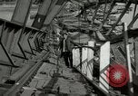 Image of German civilians cross severely damaged bridge over Elbe River Tangermunde Germany, 1945, second 34 stock footage video 65675077887