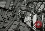 Image of German civilians cross severely damaged bridge over Elbe River Tangermunde Germany, 1945, second 35 stock footage video 65675077887