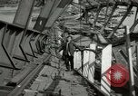 Image of German civilians cross severely damaged bridge over Elbe River Tangermunde Germany, 1945, second 36 stock footage video 65675077887