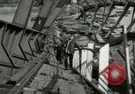 Image of German civilians cross severely damaged bridge over Elbe River Tangermunde Germany, 1945, second 37 stock footage video 65675077887