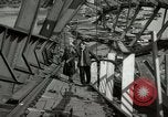 Image of German civilians cross severely damaged bridge over Elbe River Tangermunde Germany, 1945, second 40 stock footage video 65675077887