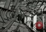 Image of German civilians cross severely damaged bridge over Elbe River Tangermunde Germany, 1945, second 41 stock footage video 65675077887