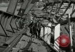 Image of German civilians cross severely damaged bridge over Elbe River Tangermunde Germany, 1945, second 42 stock footage video 65675077887