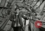 Image of German civilians cross severely damaged bridge over Elbe River Tangermunde Germany, 1945, second 43 stock footage video 65675077887