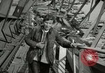 Image of German civilians cross severely damaged bridge over Elbe River Tangermunde Germany, 1945, second 44 stock footage video 65675077887